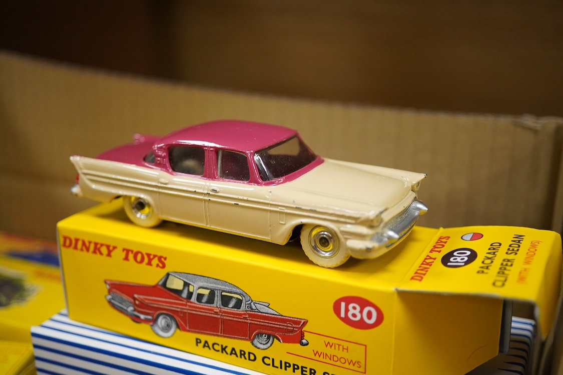 Twenty Dinky Toys, seven in reproduction boxes, including; Opel Kapitan, Austin A105 saloon, Packard Clipper Sedan, Euclid rear dump truck, Daimler ambulance, NCB electric van, etc.